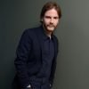 Daniel Bruhl modelling for camera